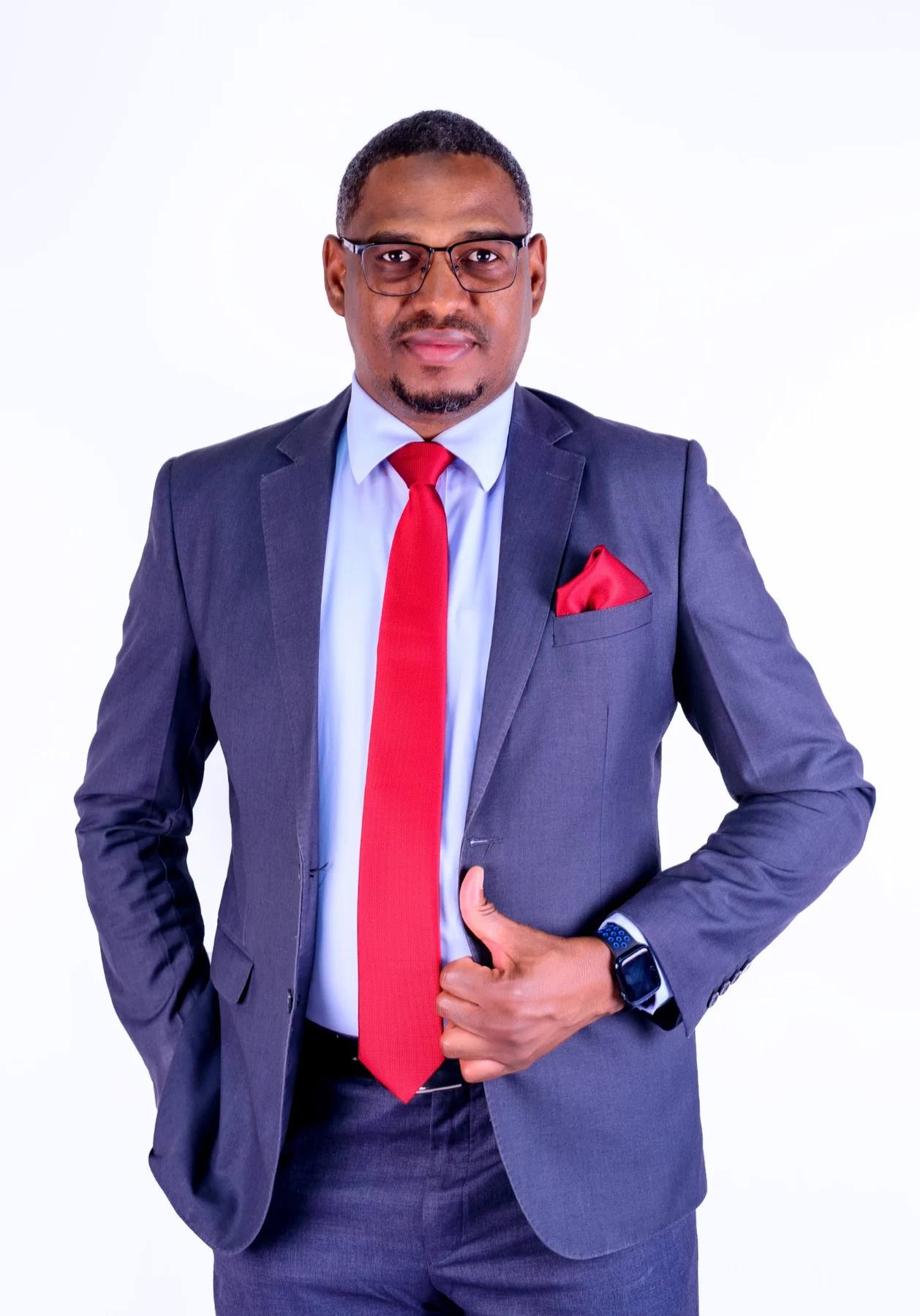 Executive portrait in a suit and red tie by PK Studios